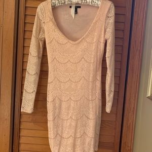 Long sleeve light pink dress with lace overlay